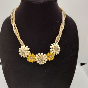 Handmade flower necklace with braided strands